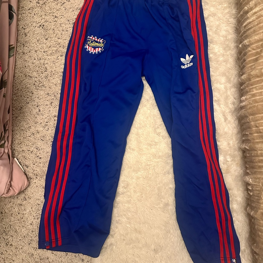 Adidas Men's Blue Joggers with Red Stripes